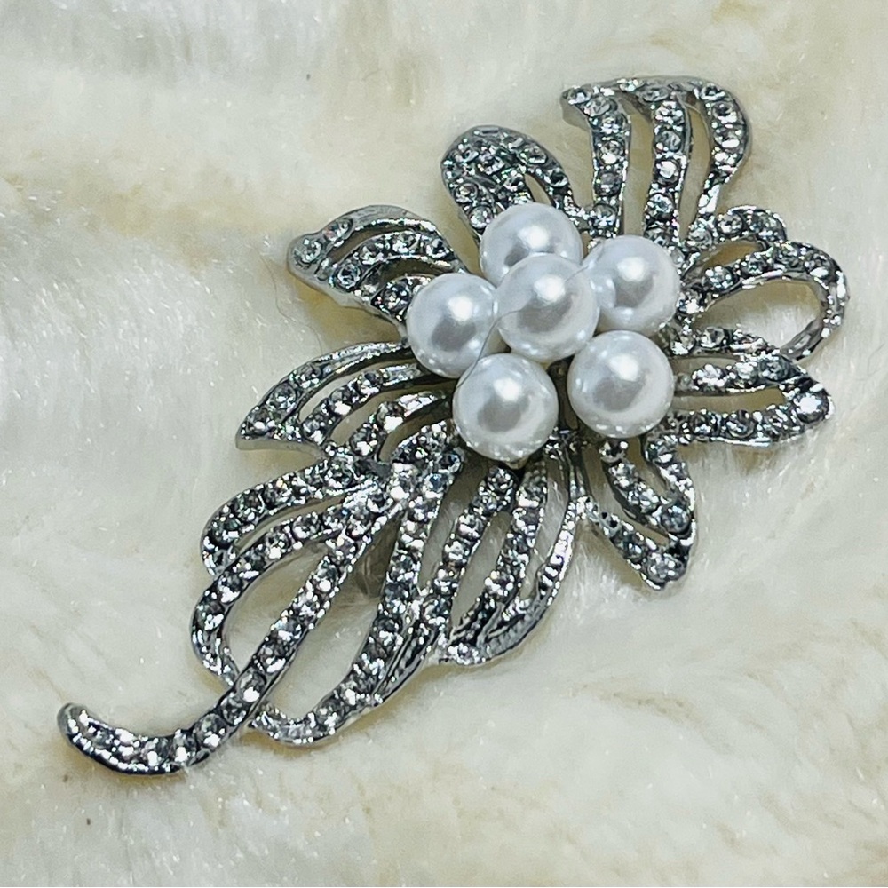 Elegant Silver and White Floral Crystal Brooch
